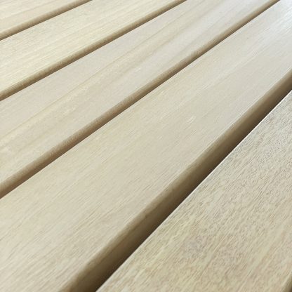 Close-up view of Abachi (Obechi) Wood grain texture - a durable and lightweight material for various applications.