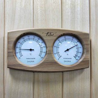 Wooden sauna hygrometer with temperature and humidity readings.